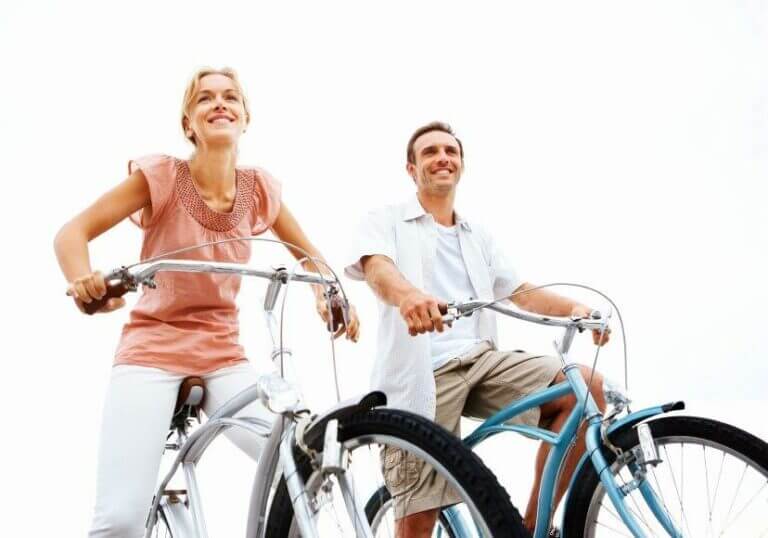 Happy couple on bikes